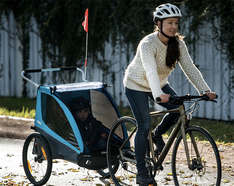 Thule Coaster XT En location / A louer chez Bike&Py à Lourdes. Remorque Enfants